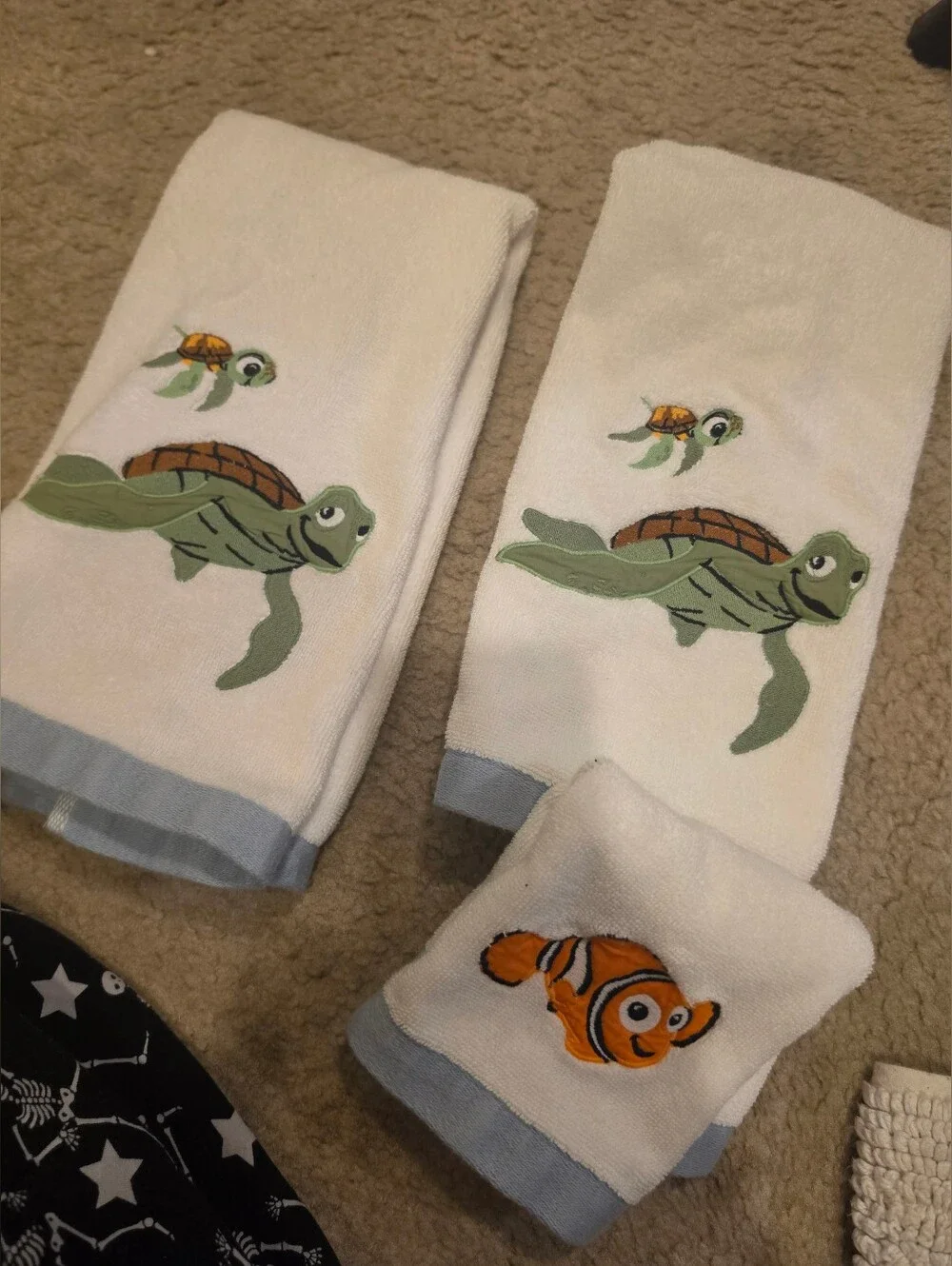 Pottery barn finding nemo shower curtain, bath mat and 3 towels